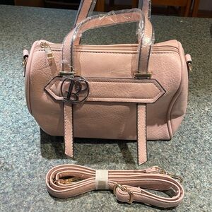 Bolzano pink handbag with detachable shoulder strap zipper top closure